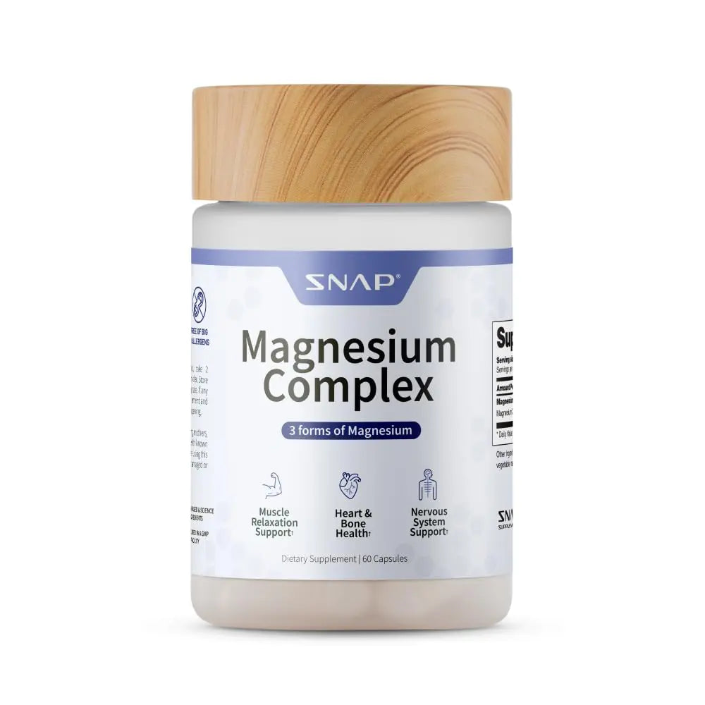Supplement jar labeled 'Magnesium Complex' with a wooden cap on a white background